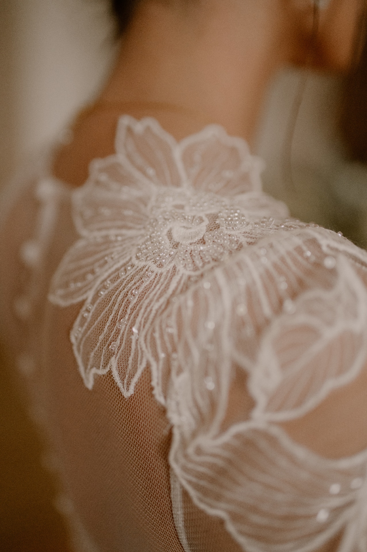 Detail de robe de mariée conçu avec des méthodes haute couture.